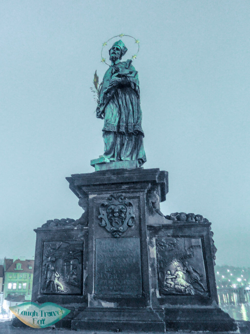 Charles Bridge statue of saint Prague, Czech Repulic - Laugh Travel Eat