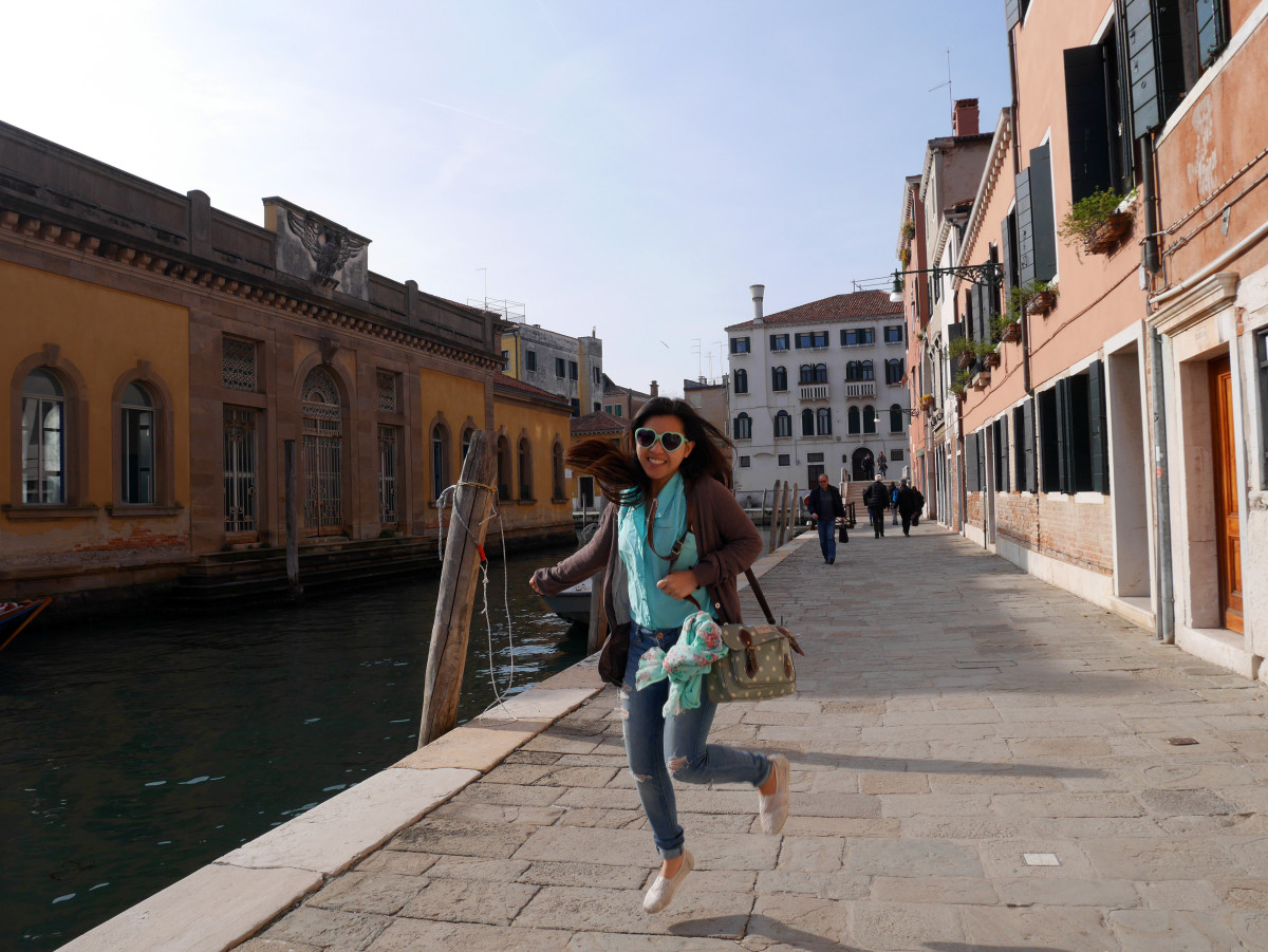 Me getting excited and jumping along a beautiful canal in Venice, Italy| Laugh Travel Eat