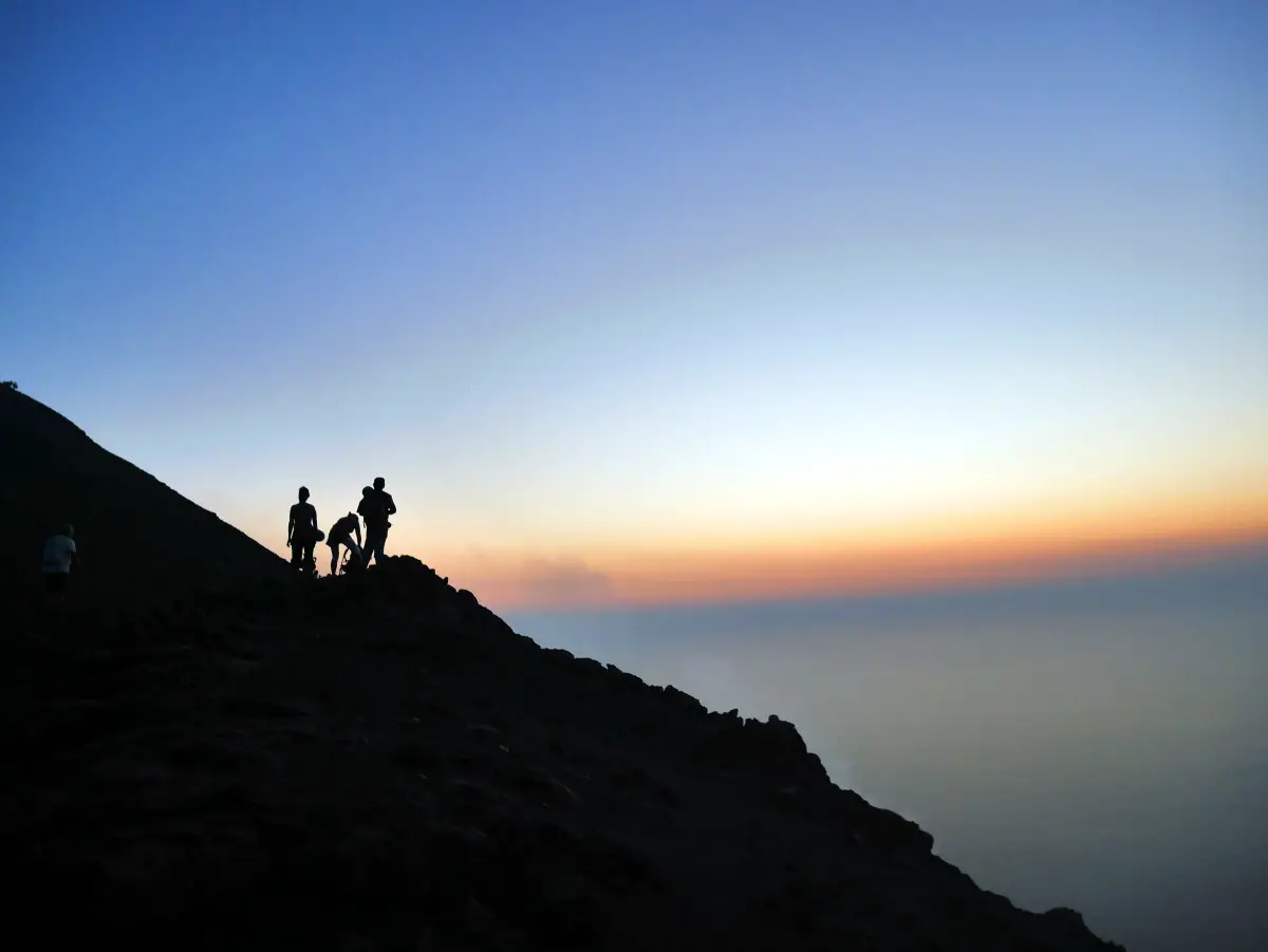 View of sunset, smoke and other hikers from Stromboli | Laugh Travel Eat