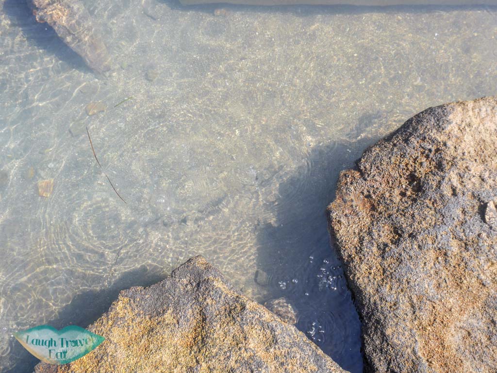sulphur-ubbling-up-at-beach-by-thermal-spring-Vulcano-aeolian-islands-sicily-italy-laugh-travel-eat