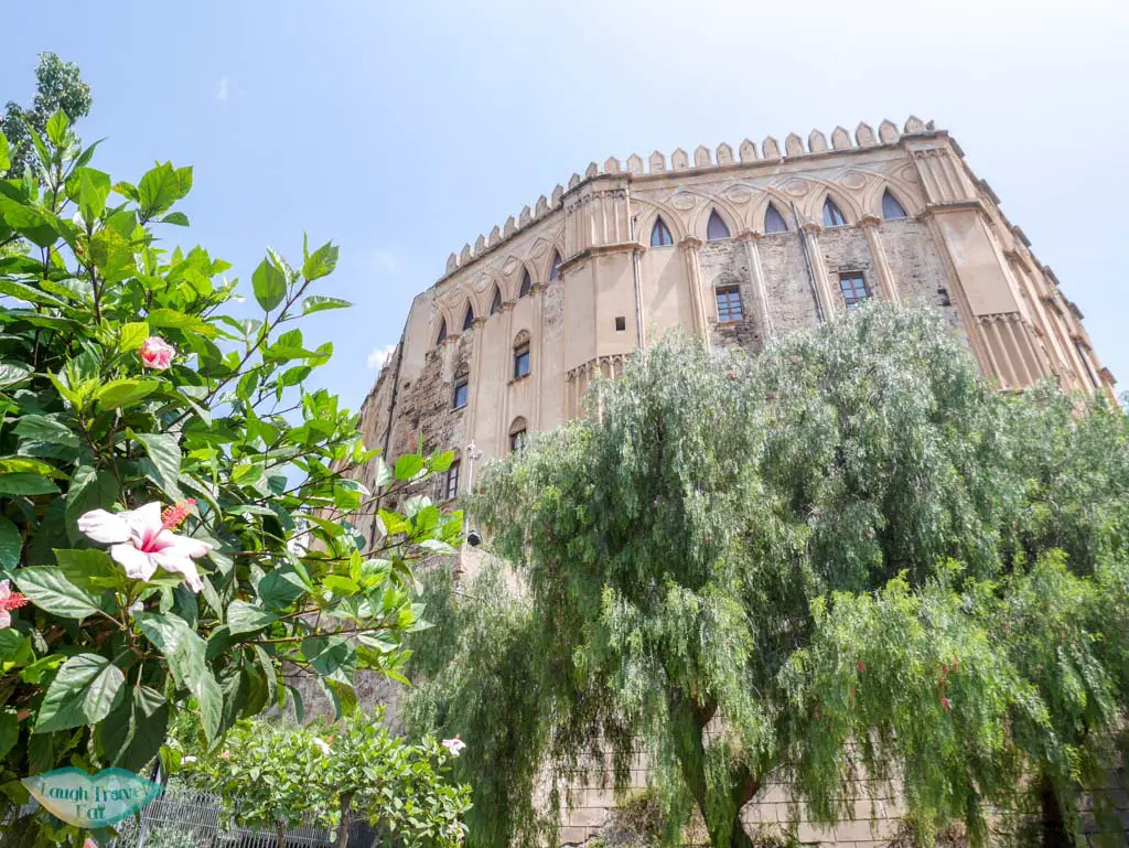 The formidable exterior of Palazzo Reale in Palermo | Laugh Travel Eat