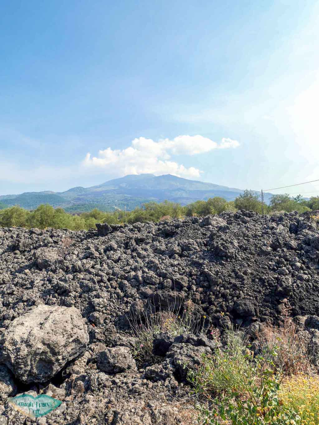 A A lava and mount etna viewed from afar catania sicily | Laugh Travel Eat