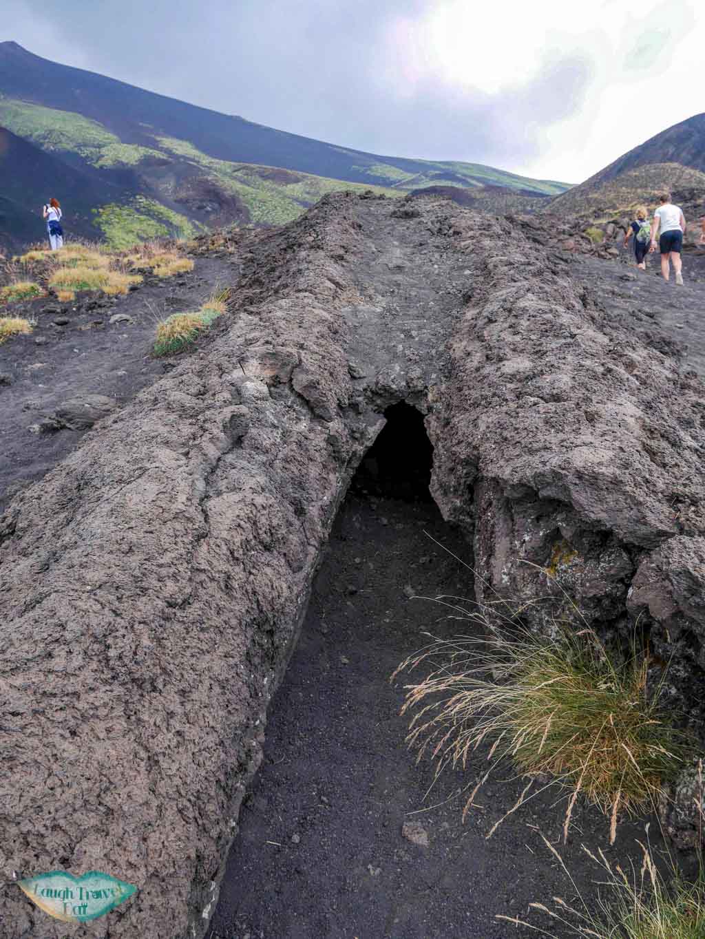 Entrance of a small lava tube amidst the lava field on Mount Etna, Catania, Sicily | Laugh Travel Eat
