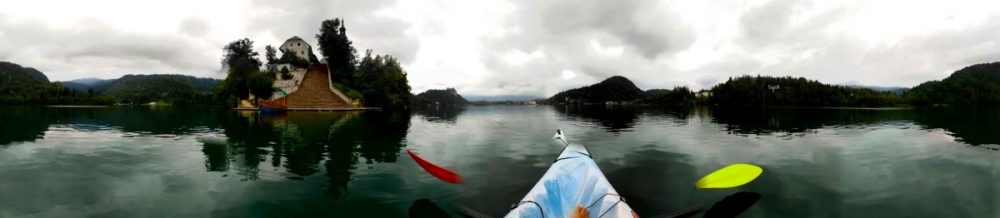 Panorama view of Lake Bled whilst kayaking | Laugh Travel Eat
