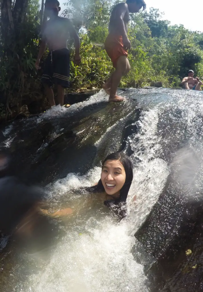 washing mud off after mud bath with elephants at Elephant Jungle Sanctuary | Laugh Travel Eat