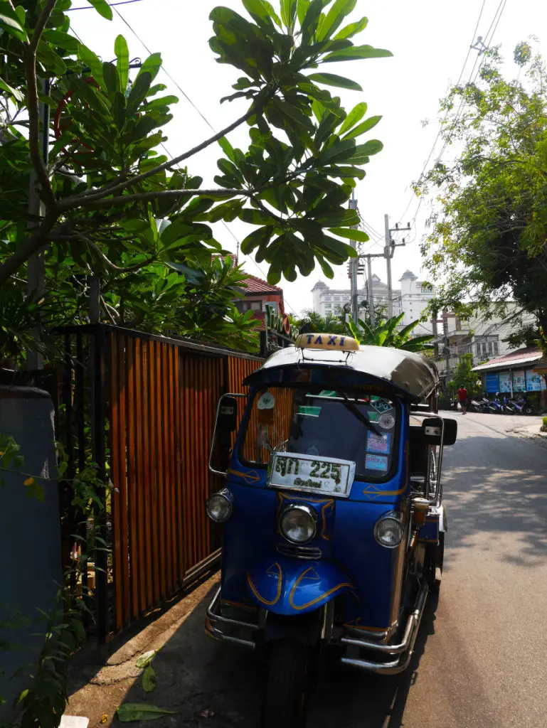 small tuk tuk on road side at Chiang Mai | Laugh Travel Eat