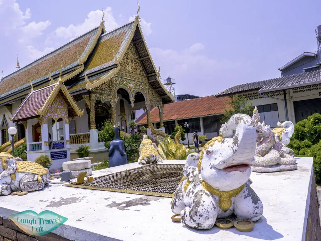 The new viharn, with a cute elephant adorning the small fountain in front, Wat Chiang Man, Chiang Mai, Thailand | Laugh Travel Eat