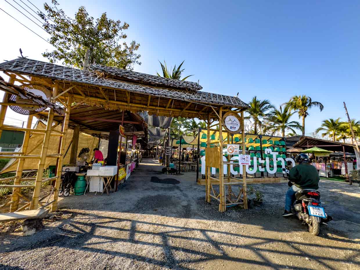 entrance coconut market Chiang Mai Thailand - laugh travel eat