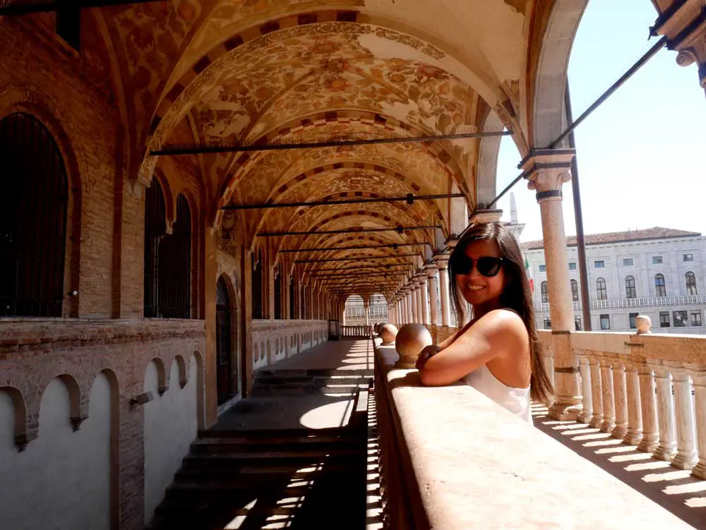 A cheeky self timer selfie in the deserted balcony of Palazzo della Ragione, Padua, Veneto, Italy | Laugh Travel Eat