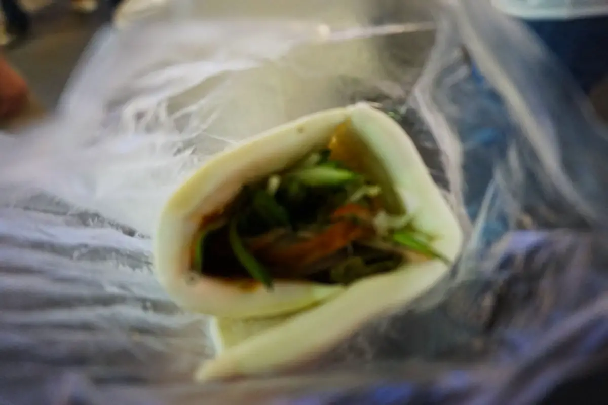 Roast duck bun at FengJia Night Market at Taichung, Taiwan | Laugh Travel Eat