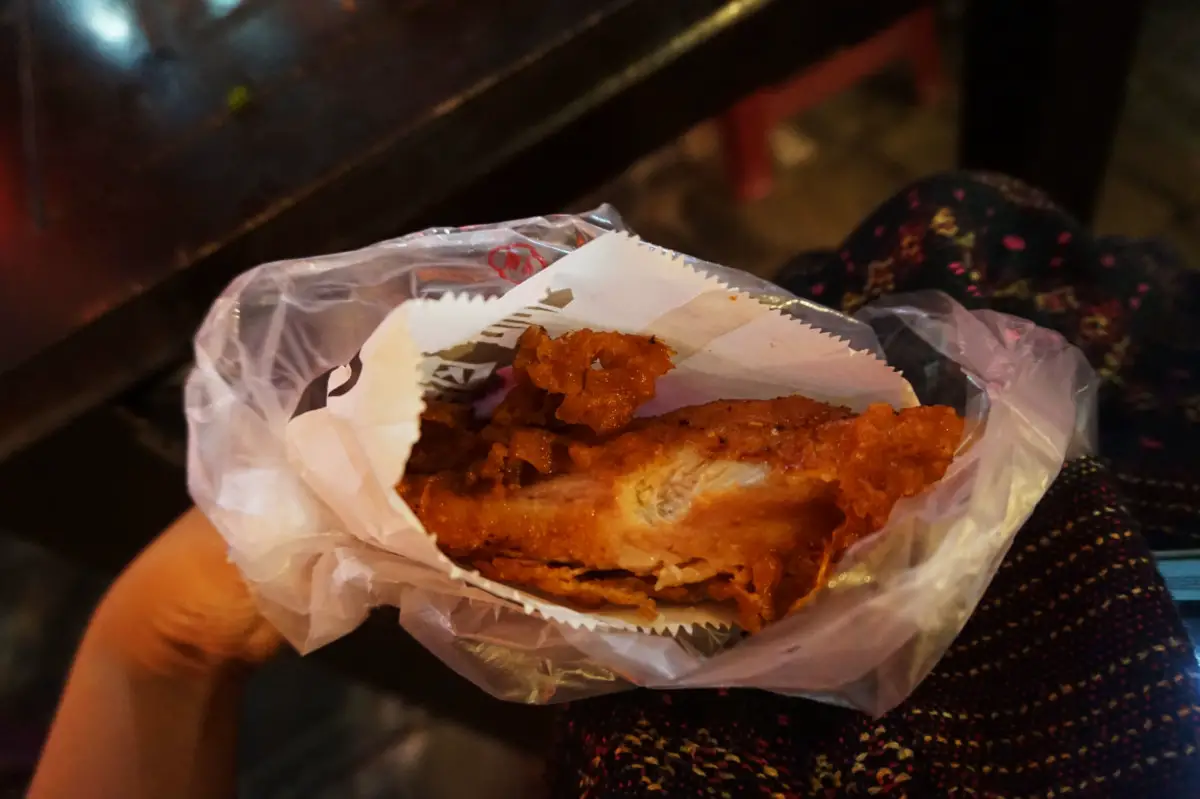 Juicy meat of chicken chop at FengJia night market, taichung, taiwan | Laugh Travel Eat