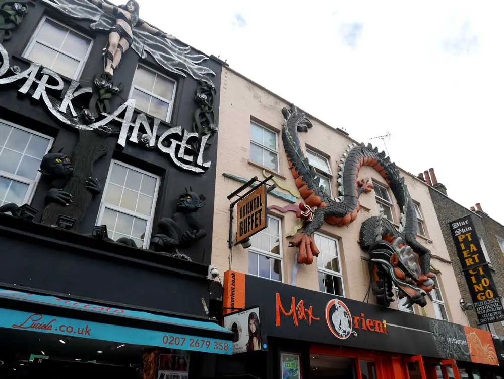 The road that leads from Camden Town Station to the market are full of quirky buildings with awesome statues, Camden Town, London, UK | Laugh Travel Eat
