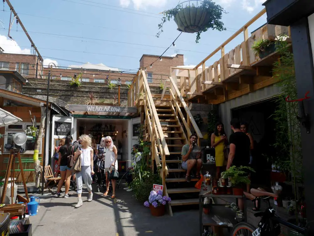 One of the many smaller markets in the area around Broadway Market, such a cool wooden structure!, East London, UK | Laugh Travel Eat