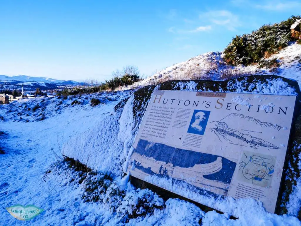 Sign marking where Hutton section is covered in snow in Edinburgh, Scotland - Laugh Travel Eat