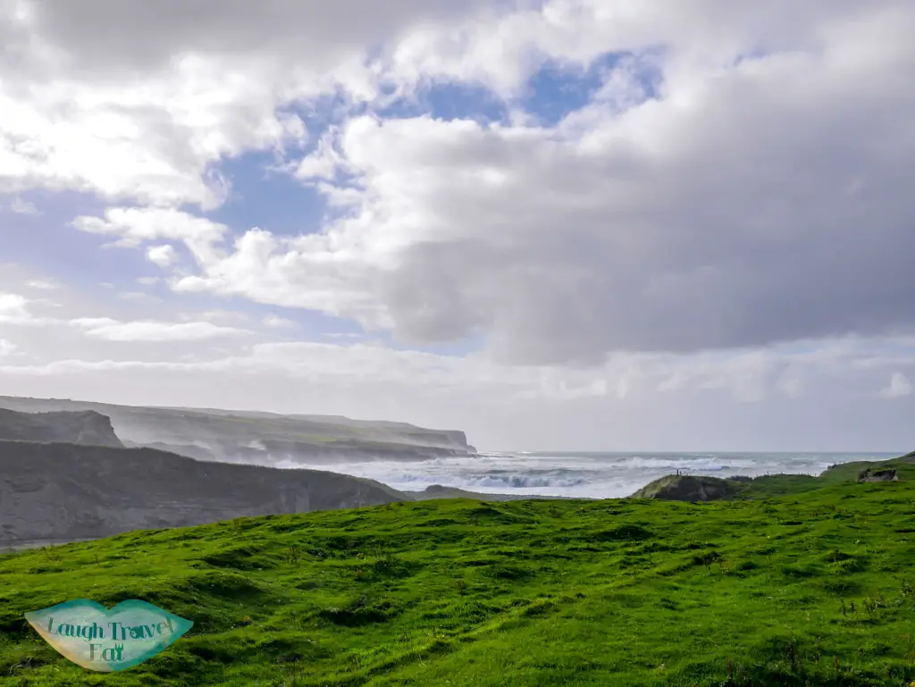 Wave-crashing-onto-the-Cliff-of-Moher-rail-tour-dublin-Ireland-Laugh-Travel-Eat