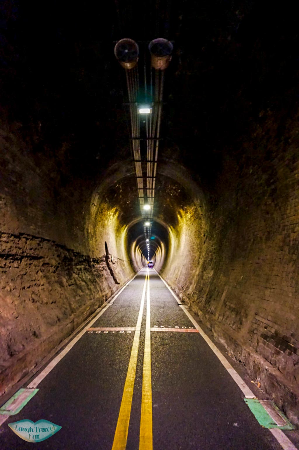 Interior of Number 9 Tunnel with light on Ho Fon Bikeway, Taichung Taiwan | Laugh Travel Eat