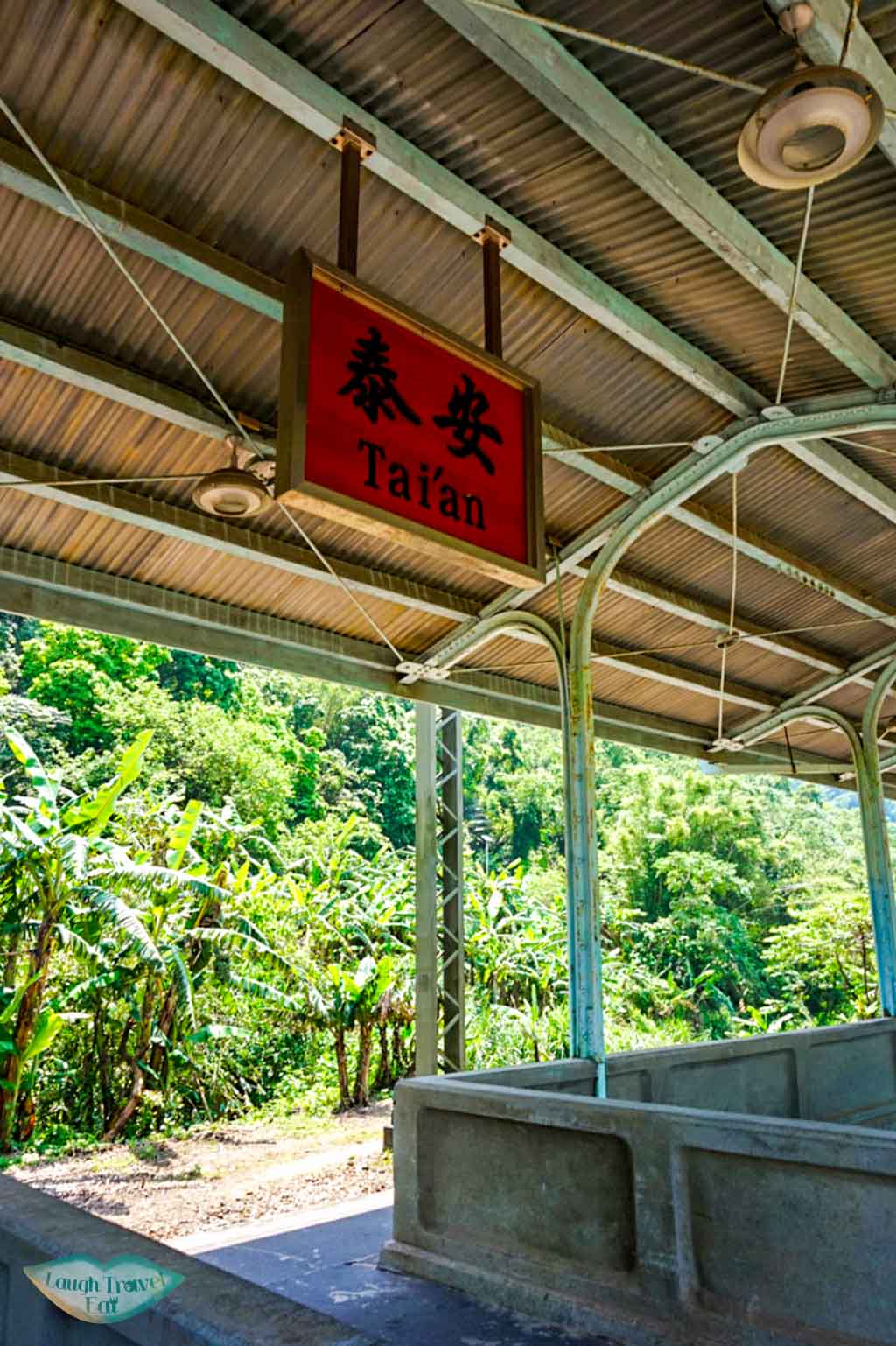 Wooden Tia'an station sign hanging on the platform Taichung Taiwan - Laugh Travel Eat