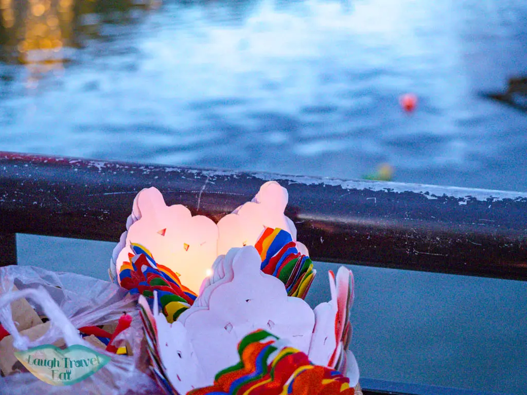 paper lanterns by the river hoi an vietnam - laugh travel eat