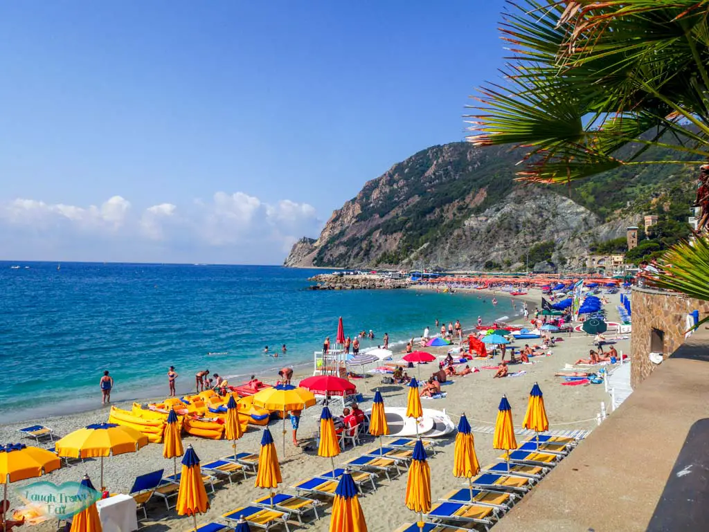 The organised sun beds and umbrella at the beach of Monterosso| Laugh Travel Eat