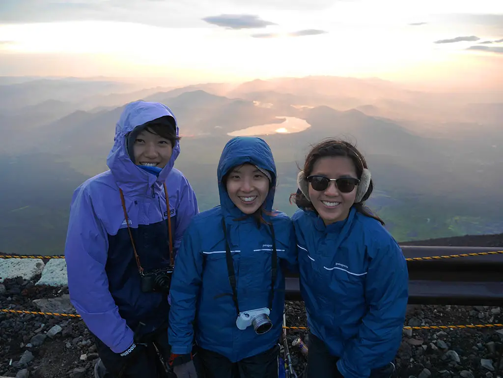 Group shot in front of the sunrise, Mount Fuji, Japan } Laugh Travel Eat