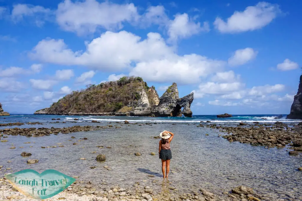 me on Atuh beach on the ground Nusa Penida Bali Indonesia - Laugh Travel Eat