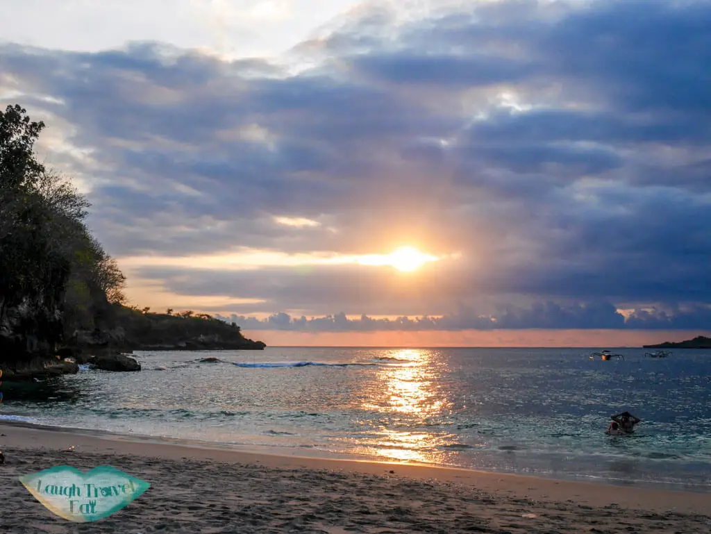 sunset at crystal bay nusa penida bali indonesia - laugh travel eat