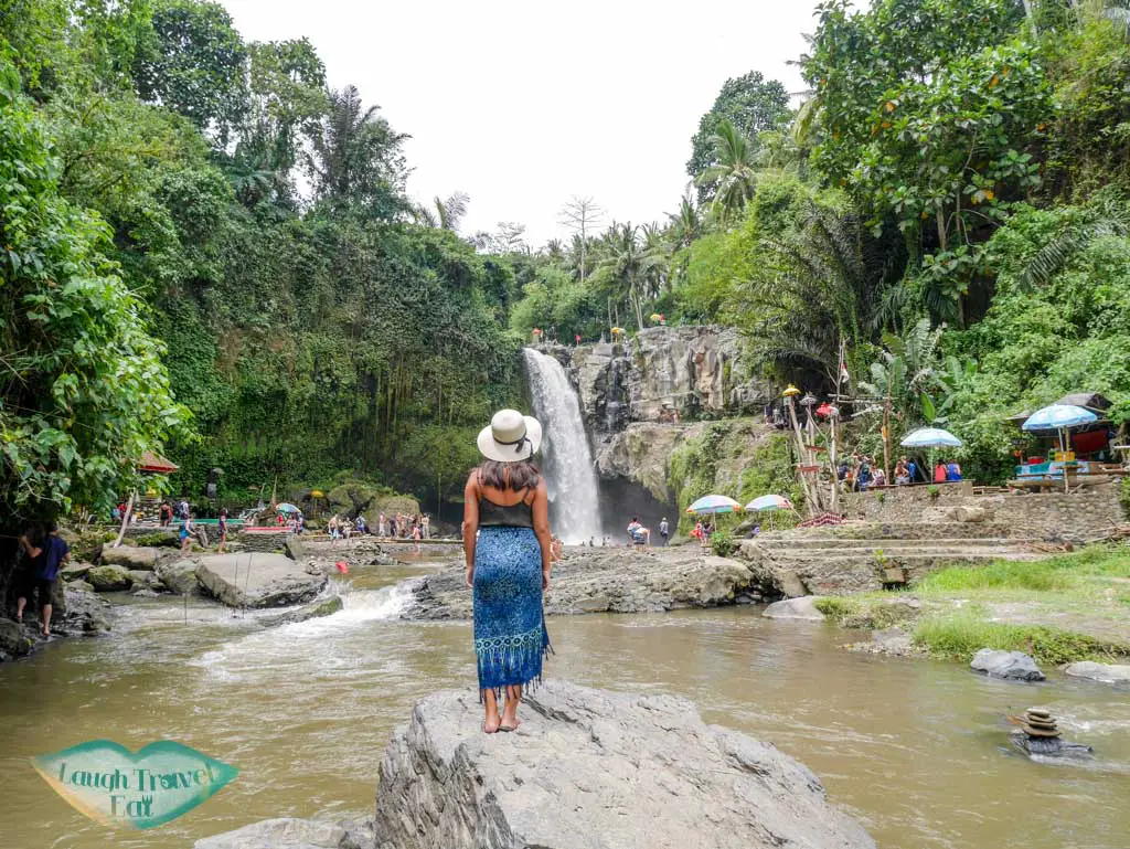 waterfall near ubud bali indoesnia - laugh travel eat
