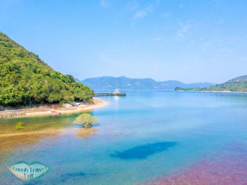 lai chi chong facing the pier sai kung hong kong - laugh travel eat