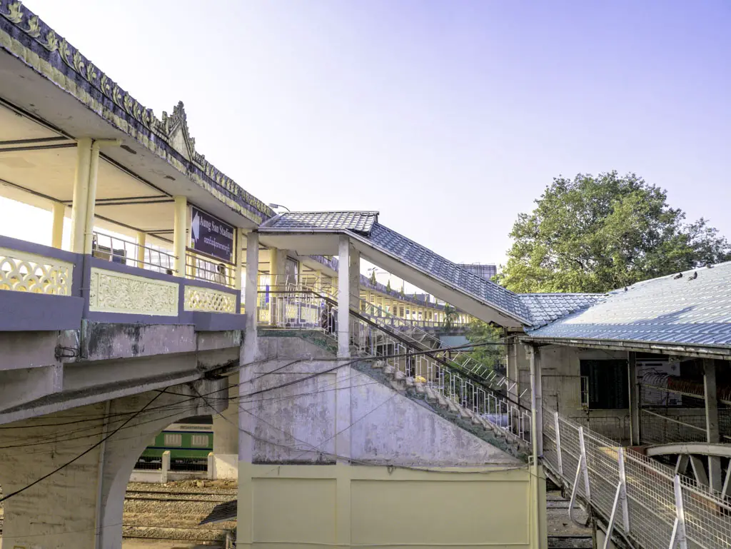 yangon central railway station reached by footbridge yangon myanmar - laugh travel eat