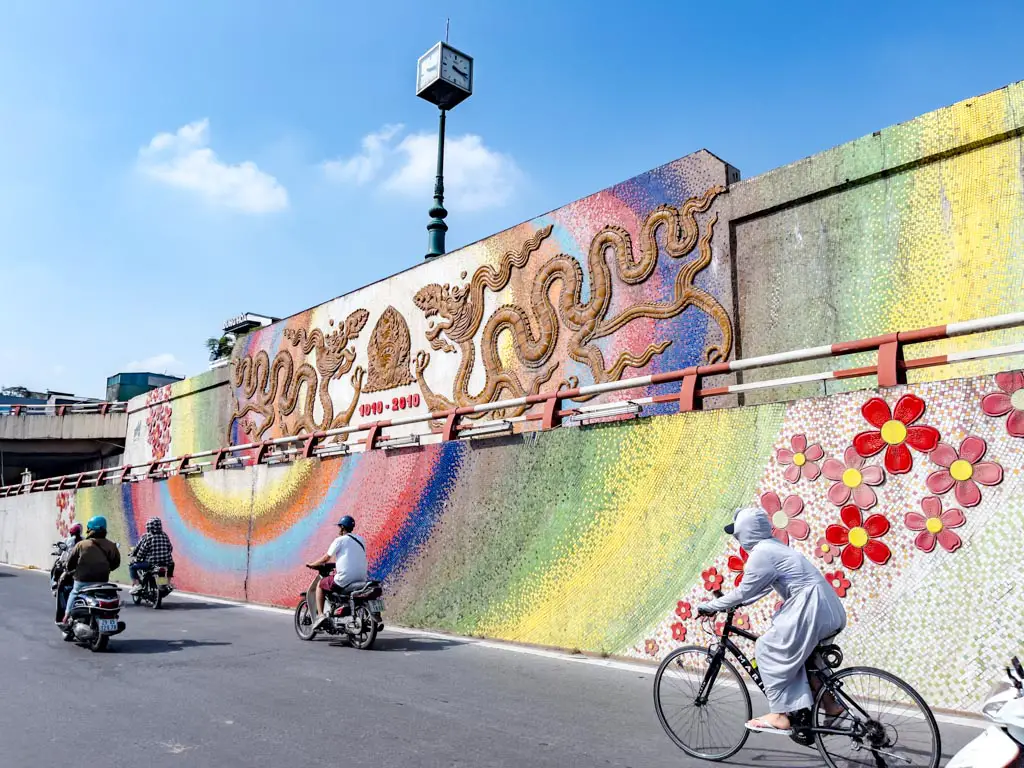 ceramic street mosaic wall hanoi Vietnam - laugh travel eat