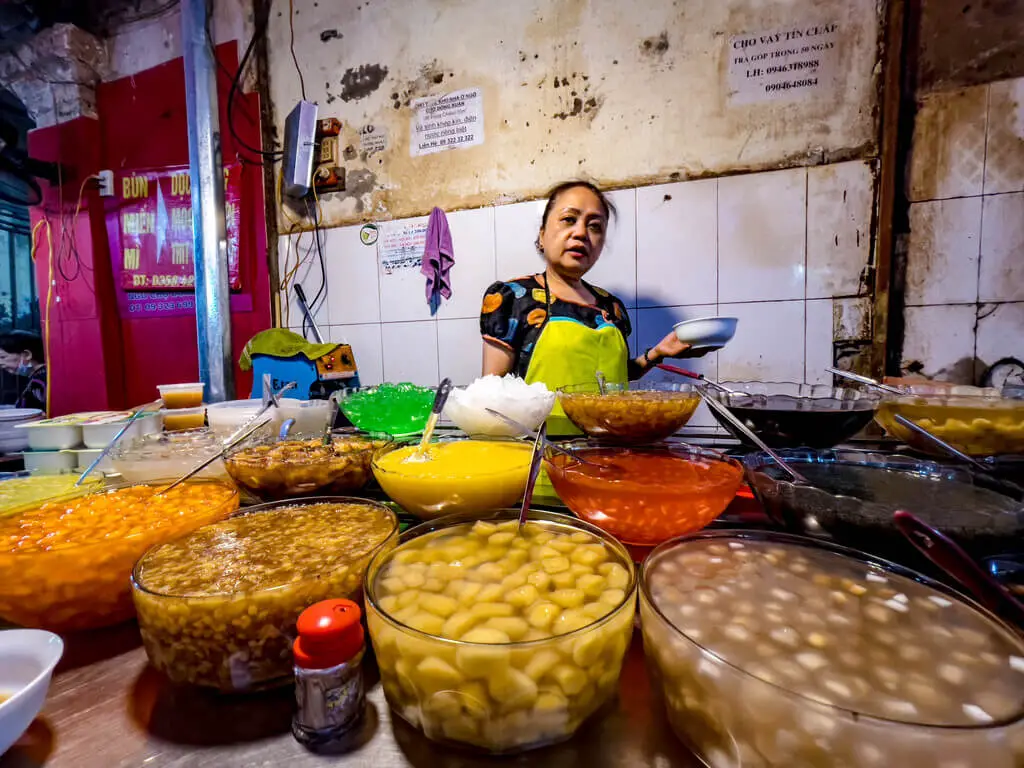 che stand a chef's tour Hanoi Vietnam - laugh travel eat