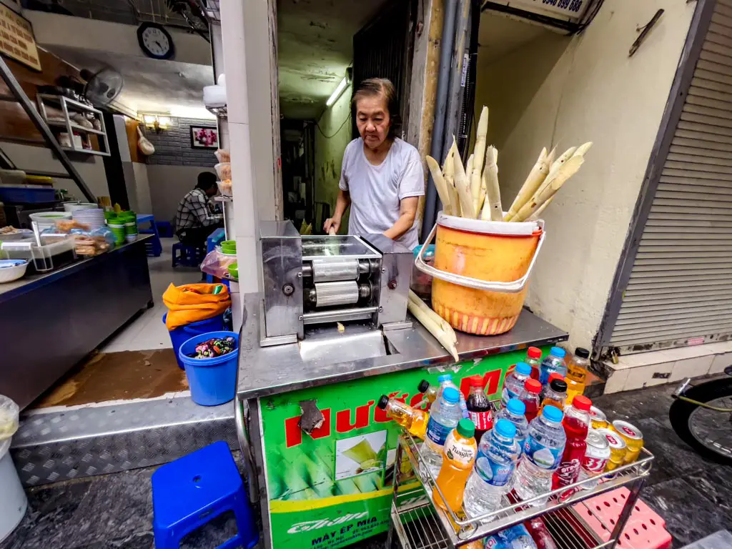 sugar cane juice Hanoi Vietnam - laugh travel eat