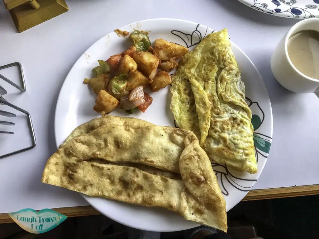 breakfast-at-Peace-and-Excellent-View-Guest-House-Ghorepani-Poon-Hill-Trek-Annapurna-Conservation-Area-Nepal-laugh-travel-eat