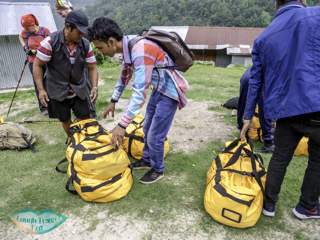 our-amazing-porter-for-Poon-Hill-Trek-Annapurna-Conservation-Area-Nepal-laugh-travel-eat