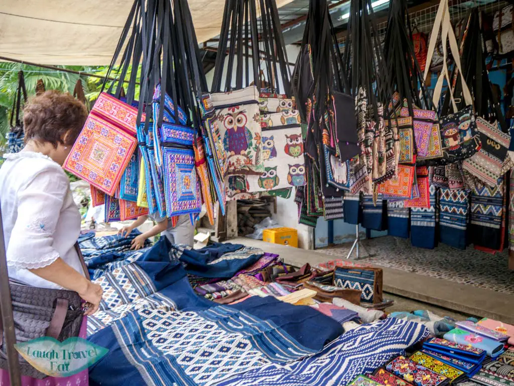 fabric at morning market luang prabang laos - laugh travel eat