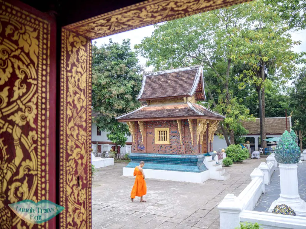 looking frm one prayer hall to another at Wat Xiengthong luang prabang laos - laugh travel eat