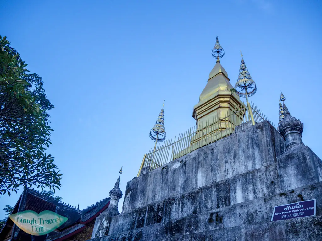 temple on mount phousi luang prabang laos - laugh travel eat