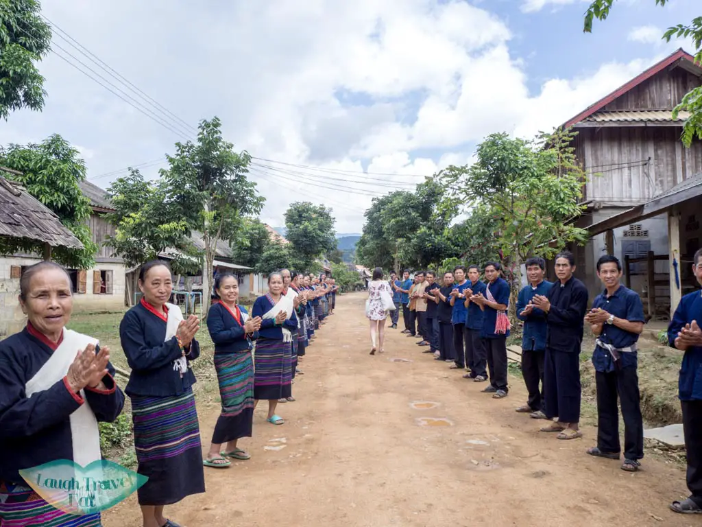 welcome-by-villagers-nanyang-thai-village-nong-khiaw-luang-prabang-laos-laugh-travel-eat
