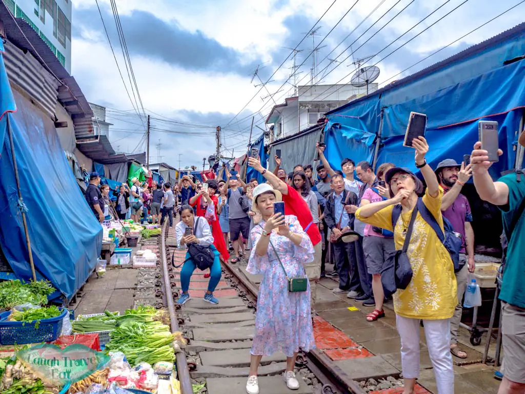 crowds-at-mekong-railway-market-bangkok-thailand-laugh-travel-eat