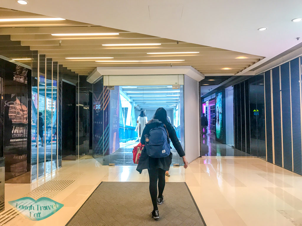 pedestrian-bridge-yoho-mall-hong-kong-laugh-travel-eat