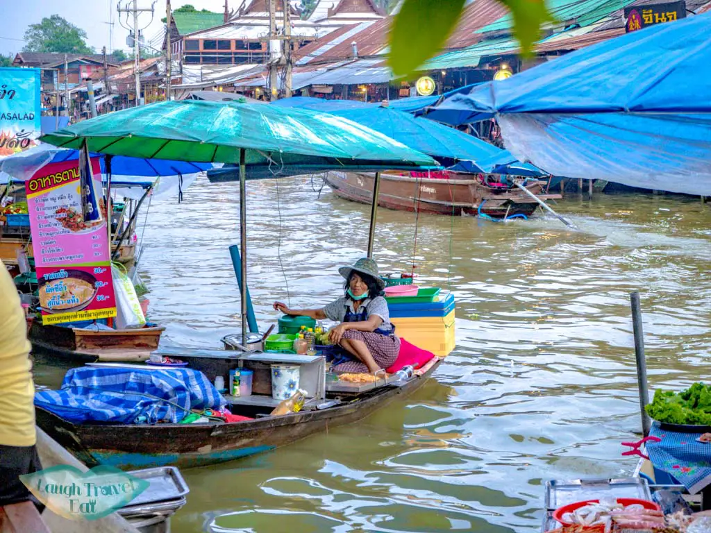 women-on-boat-at-amphawa-floating-market-bangkok-thailand-laugh-travel-eat