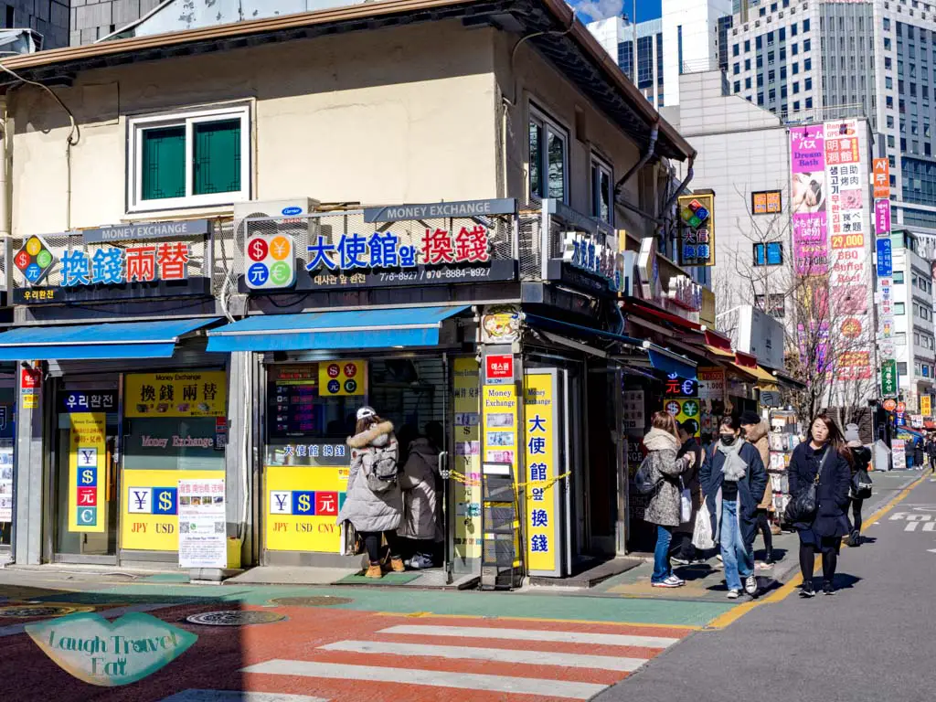 currency-exchange-myeongdong-seoul-south-korea-laugh-travel-eat