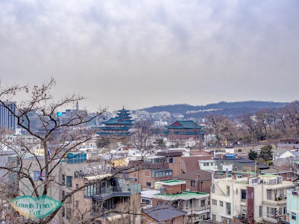 view-of-palace-from-hanok-village-seoul-south-korea-laugh-travel-eat