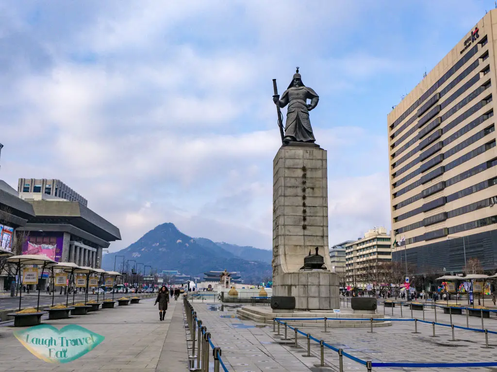 wide-view-statue-of-Admiral-Yi-Sun-Sin-Gwanghwamun-Plaza-seoul-south-korea-laugh-travel-eat