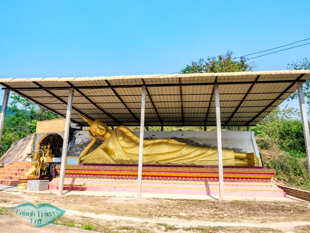 reclining-buddha-and-small-cave-luang-namtha-stupa-luang-namtha-laos-laugh-travel-eat