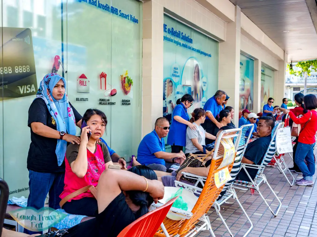blind-people-massage-gaya-street-sunday-market-kota-kinabalu-sabah-malaysia-laugh-travel-eat