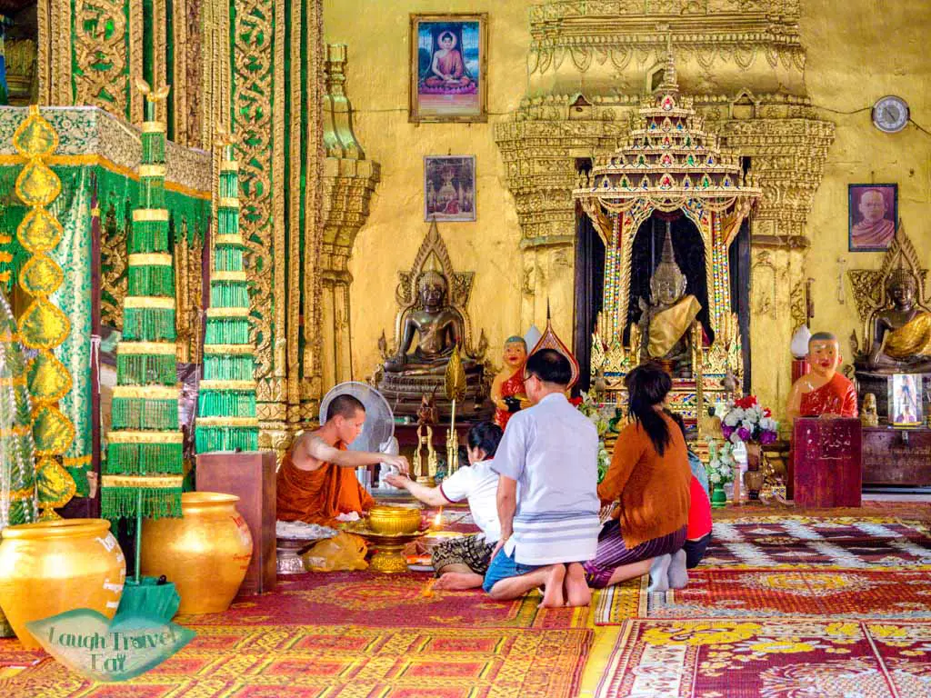 inside-wat-si-muang-vientiane-laos-laugh-travel-eat
