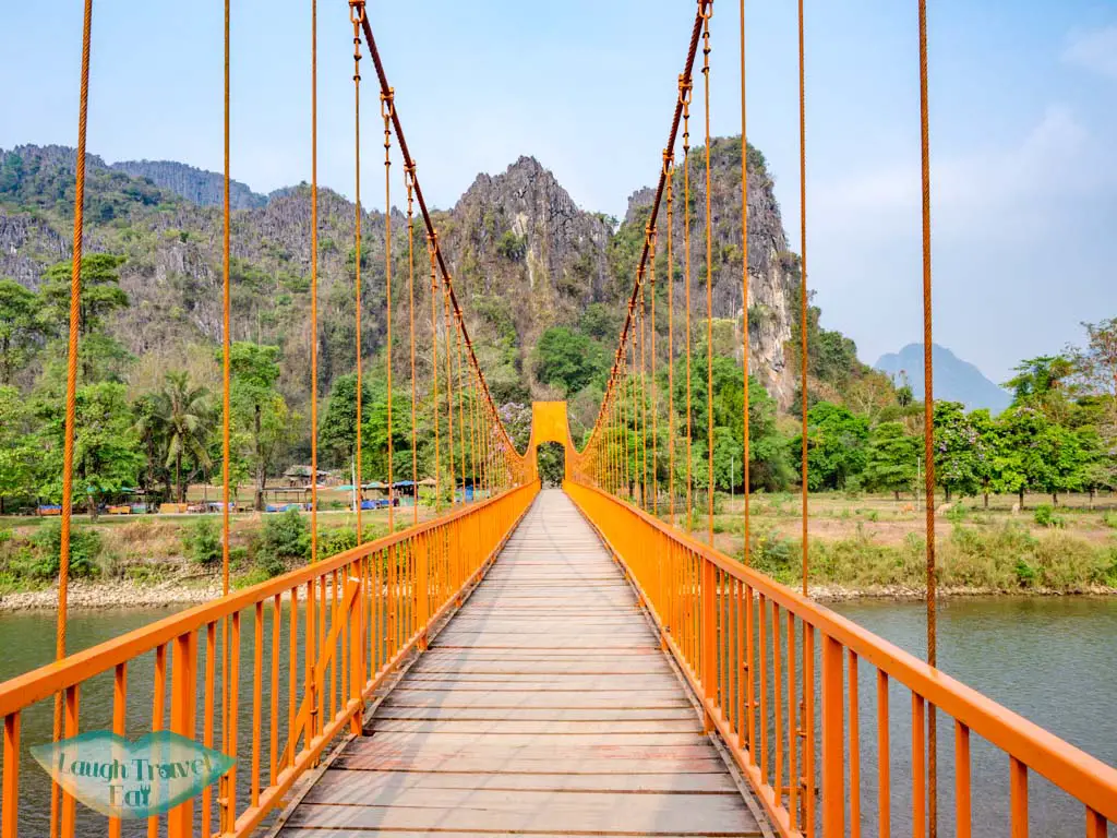 orange-suspension-bridge-vang-vieng-laos-laugh-travel-eat