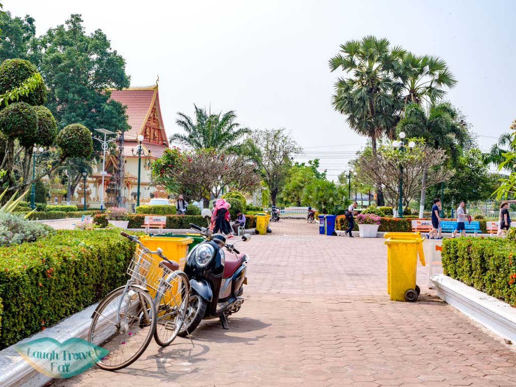 parking-bicycle-outside-pha-that-luang-vientiane-laos-laugh-travel-eat