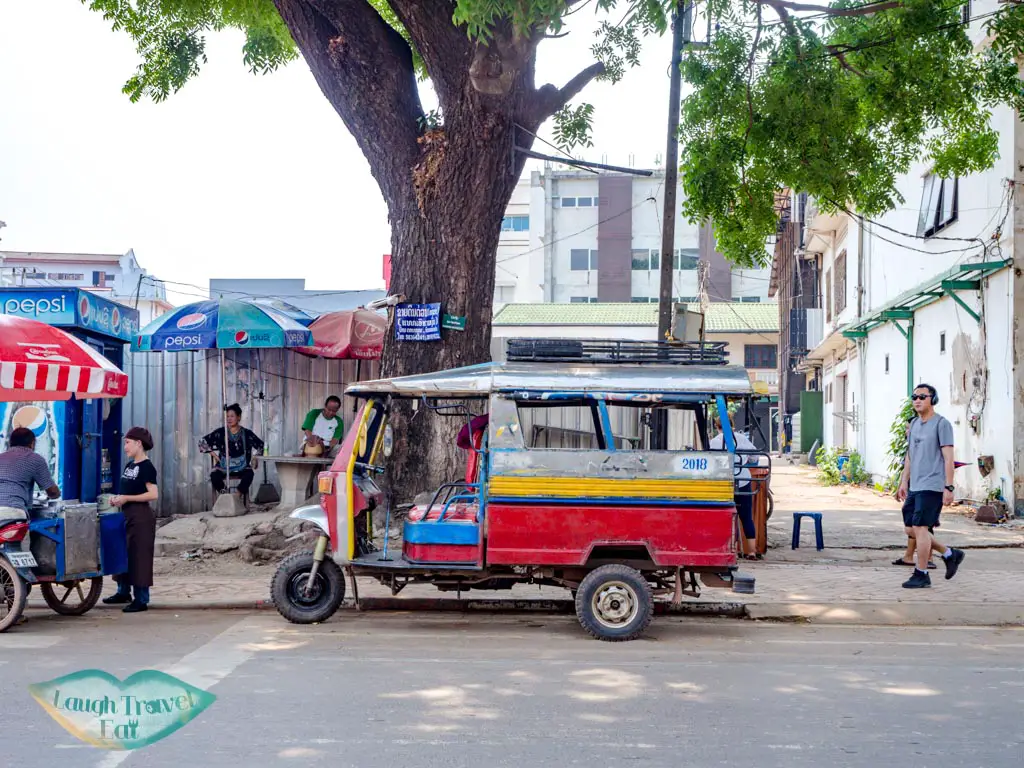 tuk-tuk-on-the-street-vientiane-laos-laugh-travel-eat